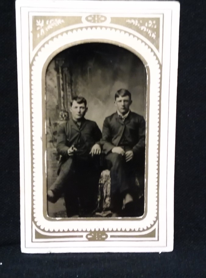 Tintype 2 young men seated