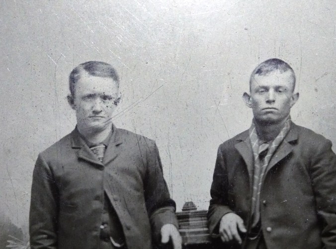 Tintype 2 young men standing