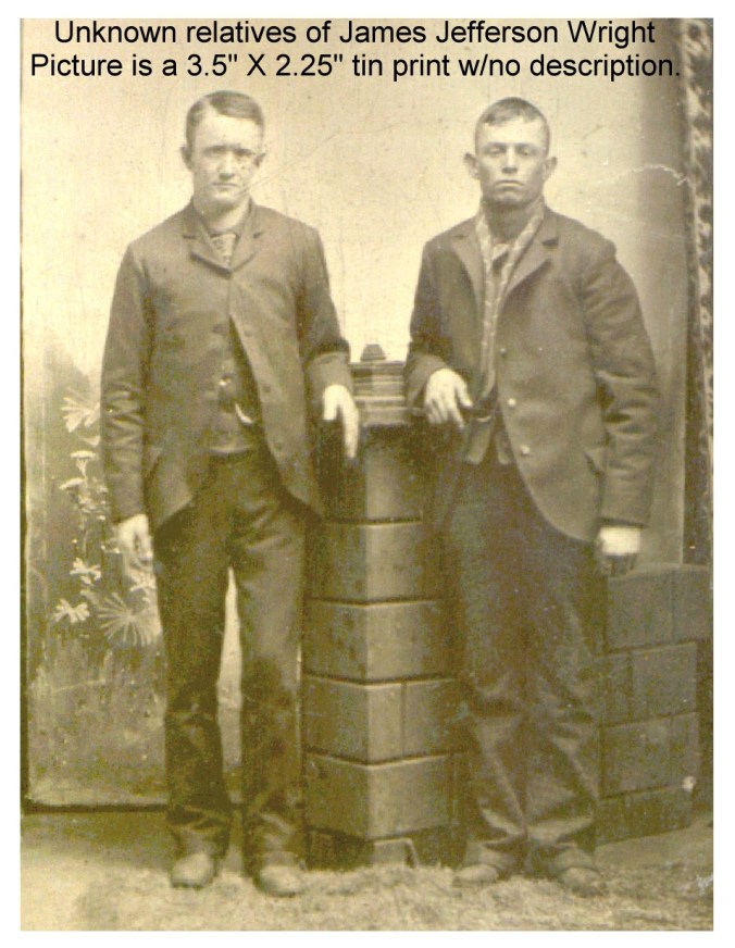 Unknown tin #1 2 men standing
