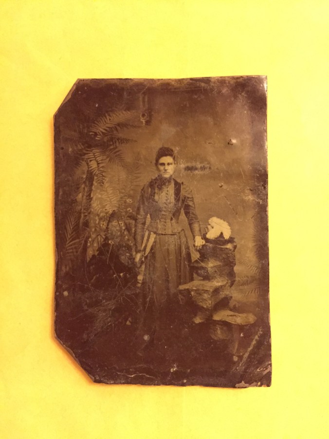 woman-standing_rock-prop-portrait